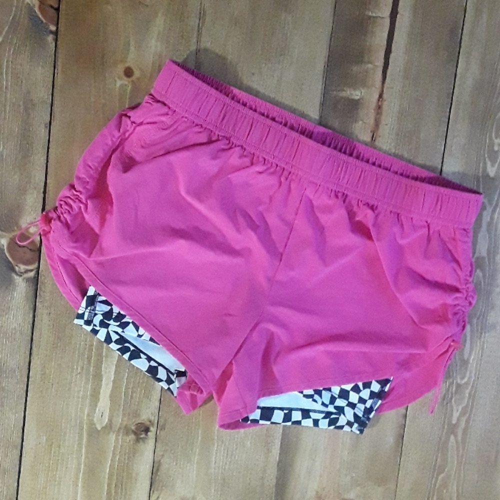 Pink performances wear shorts